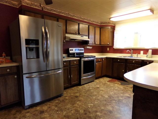 201 Spring Street Decherd, TN 37324 - Photo 21 of 26 Kitchen-stainless refrigerator & range