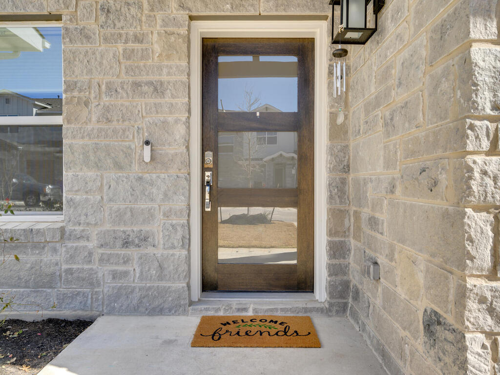 2257 Local Rebel Loop Leander, TX 78641 - Photo 3 of 26 a view of an entrance door of the living room