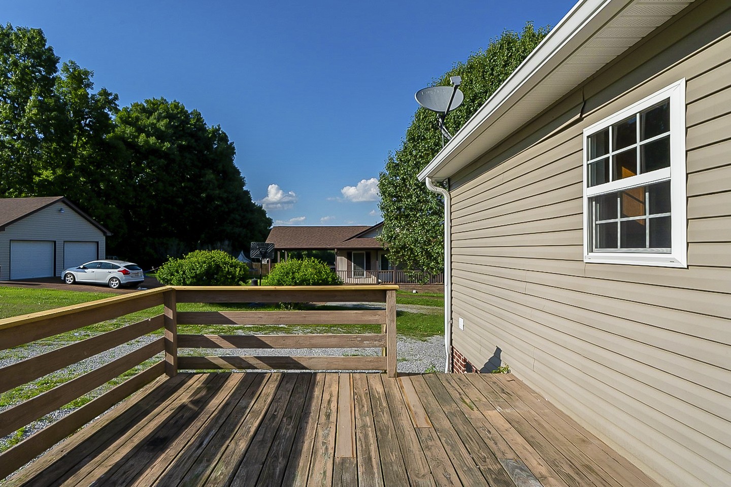 1505 Rapids Road Portland, TN 37148 - Photo 22 of 22 a view of backyard with deck and outdoor seating