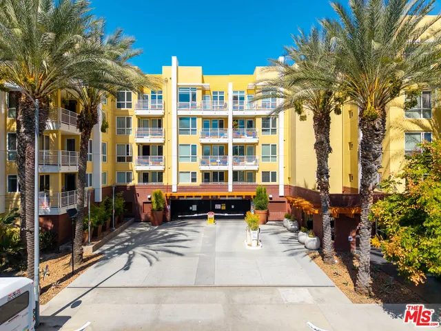 a view of a building with a yard