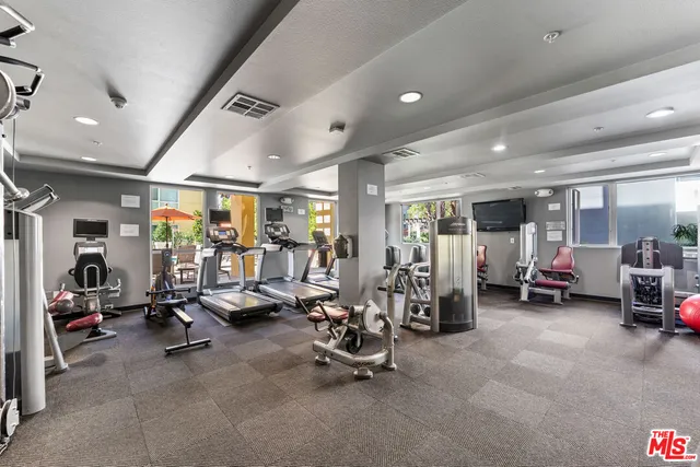 a view of a room with gym equipment