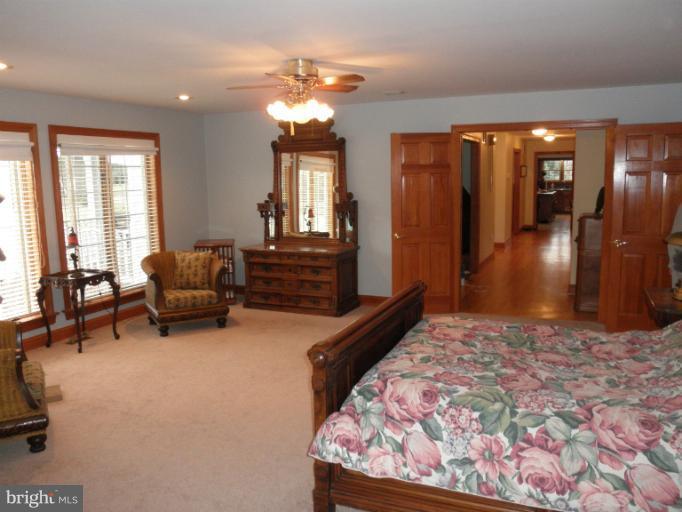 3995 Perry Hall Road Perry Hall, MD 21128 - Photo 2 of 26 a living room with furniture and a chandelier