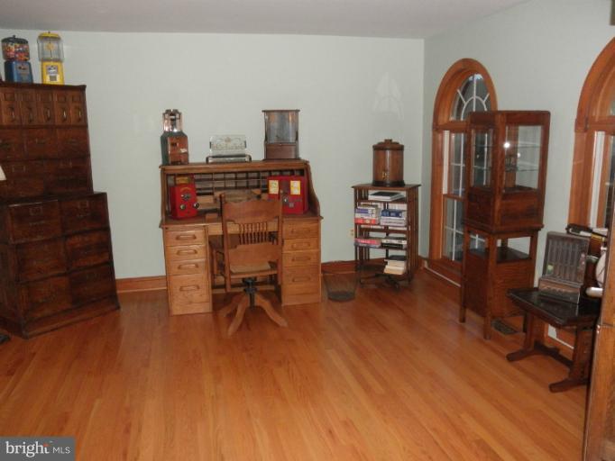 3995 Perry Hall Road Perry Hall, MD 21128 - Photo 14 of 26 a view of a workspace with furniture and wooden floor