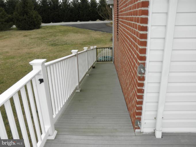 3995 Perry Hall Road Perry Hall, MD 21128 - Photo 9 of 26 a view of a balcony with wooden floor