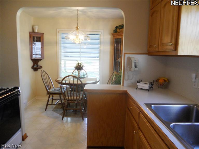 1635 Harwich Road Cleveland, OH 44124 - Photo 4 of 11 Light & Bright Dinette Area Opens to Kitchen and Living Room with New Windows