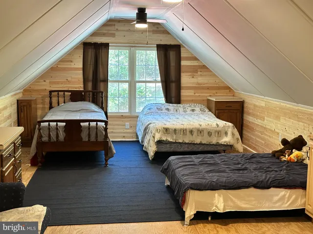 a view of living room kitchen with furniture and rug