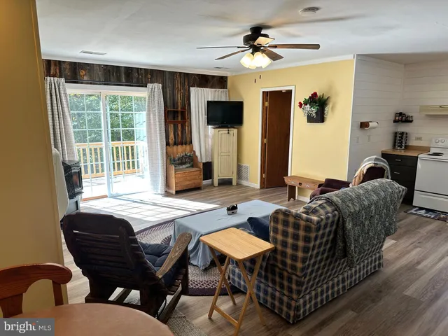 a bedroom with a bed and flat screen tv