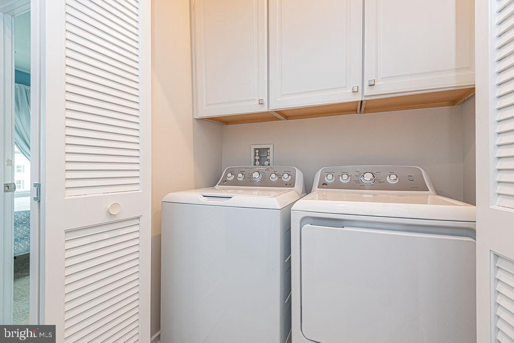 12461 Coastal Marsh Drive, Unit 708 Berlin, MD 21811 - Photo 40 of 56 a utility room with dryer and washer