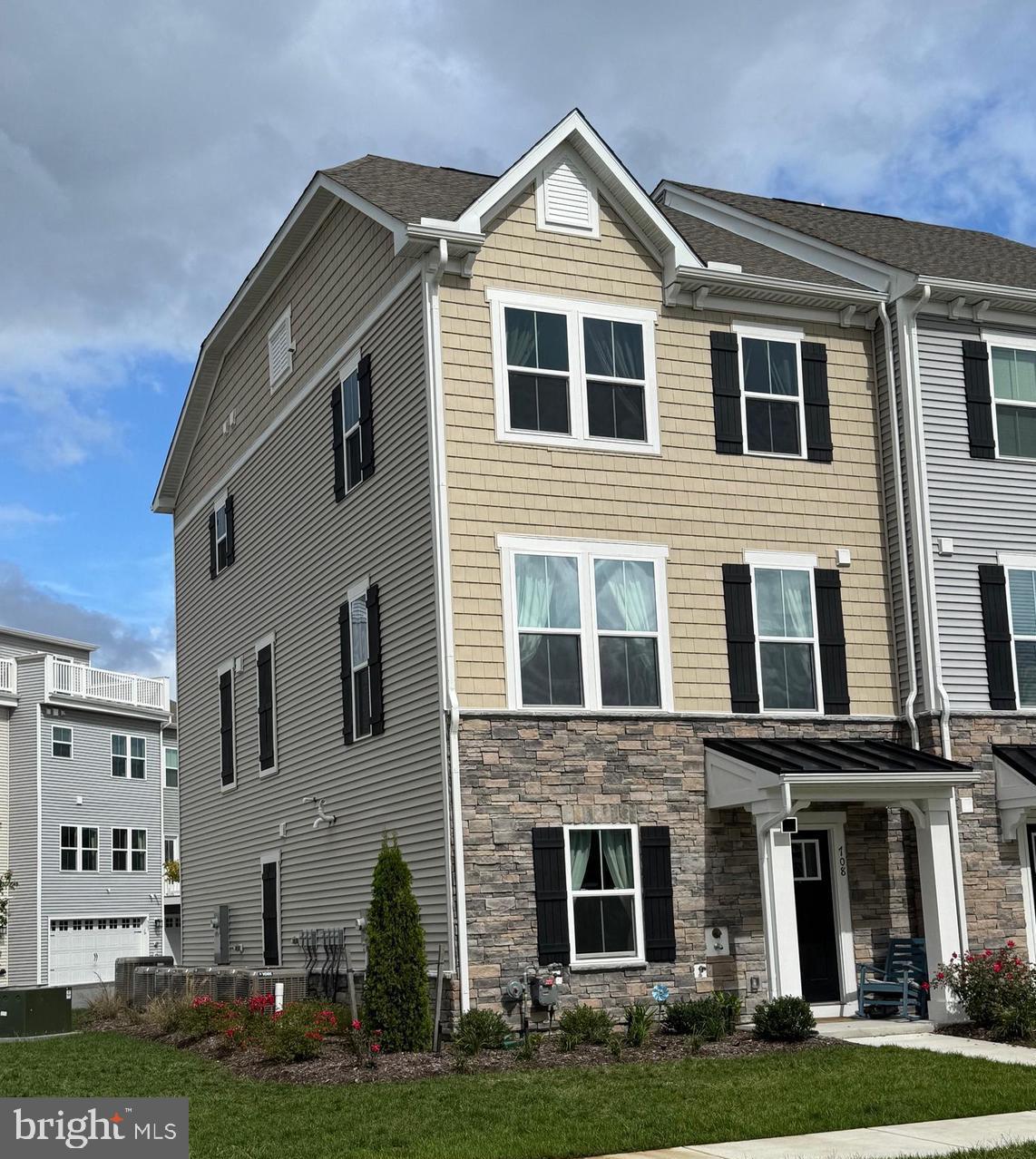 12461 Coastal Marsh Drive, Unit 708 Berlin, MD 21811 - Photo 4 of 56 a front view of building with yard