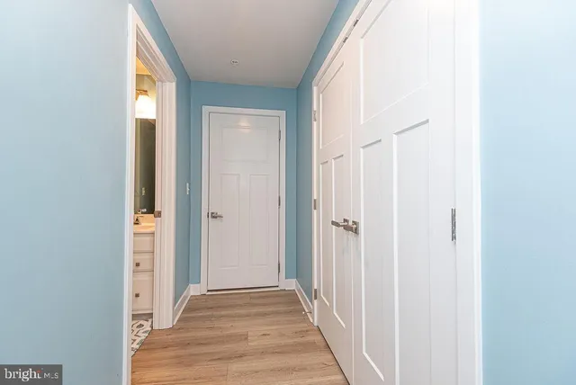 a view of an chairs and tables on the sidewalk