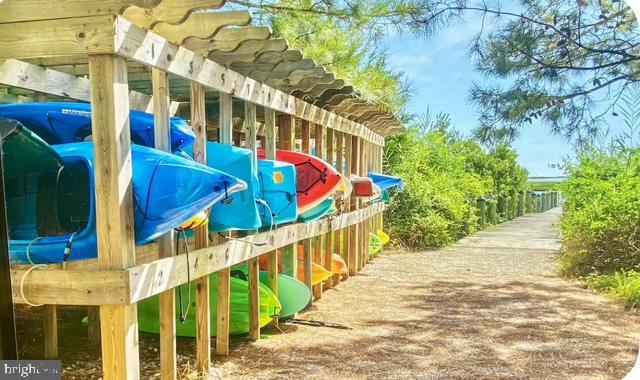12461 Coastal Marsh Drive, Unit 708 Berlin, MD 21811 - Photo 47 of 56 a view of an chairs and tables on the sidewalk