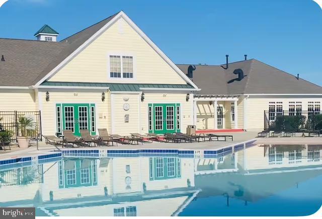 12461 Coastal Marsh Drive, Unit 708 Berlin, MD 21811 - Photo 48 of 56 a front view of a house with a large windows
