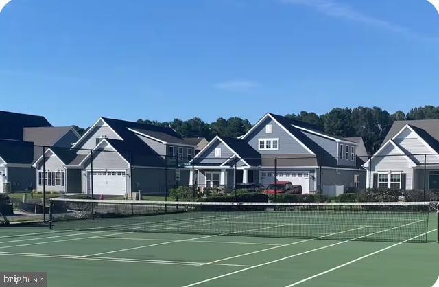 12461 Coastal Marsh Drive, Unit 708 Berlin, MD 21811 - Photo 50 of 56 a view of house with a big yard and large trees