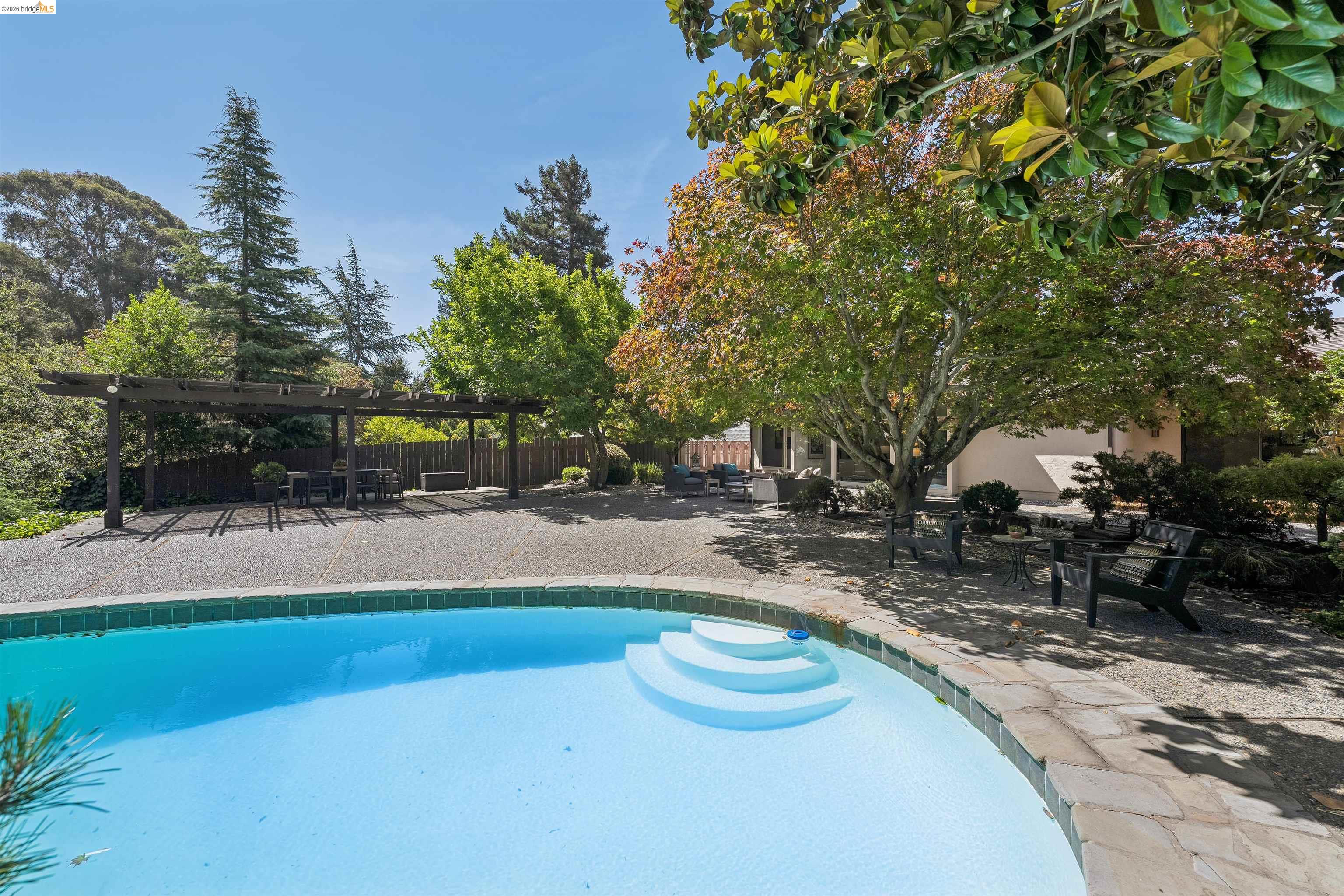 7 Jo Lin Court El Sobrante, CA 94803 - Photo 88 of 99 Outdoor pool with integrated steps and a natural stone coping