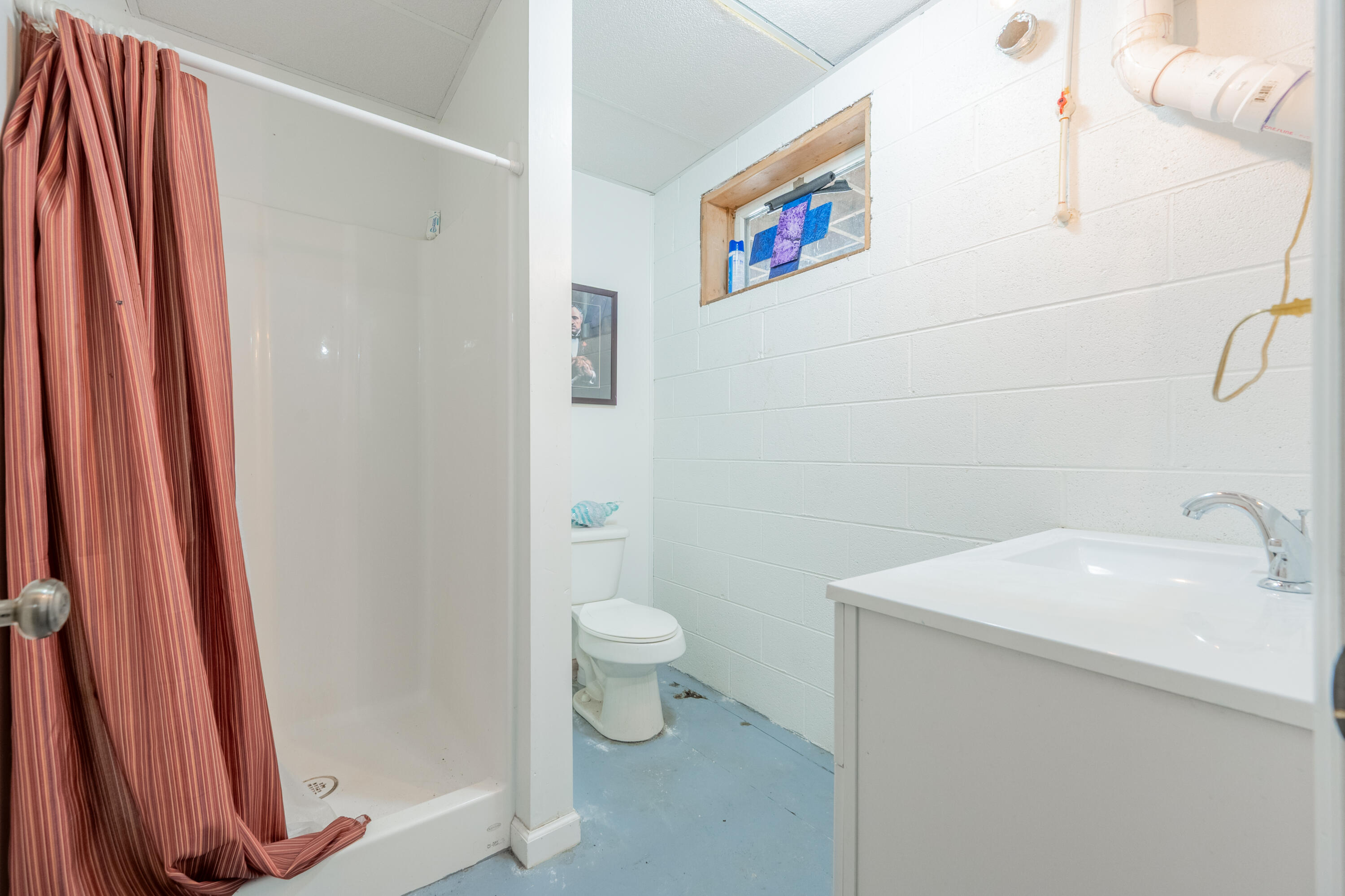 183 Pine Mountain Road Northeast Floyd, VA 24091 - Photo 33 of 54 a bathroom with a sink and a toilet