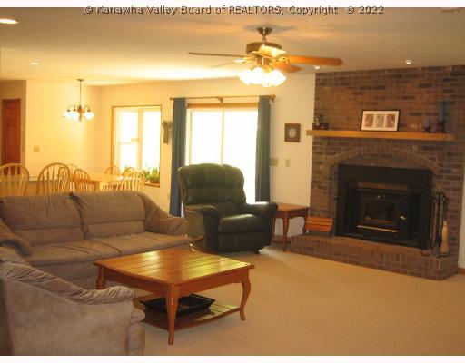 199 Bluelick Road Winfield, WV 25213 - Photo 3 of 8 Den/Family/Great Room. Woodburning fireplace