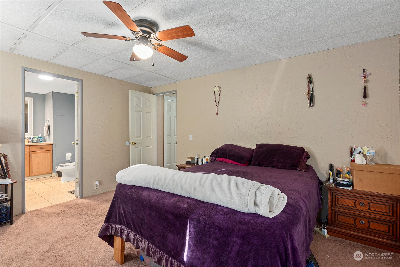267 Limmer Road Winlock, WA 98596 - Photo 16 of 25 a bedroom with a bed and a chandelier