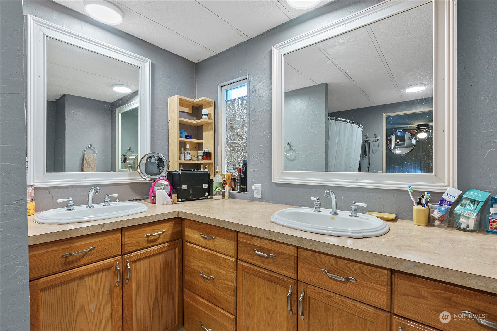 267 Limmer Road Winlock, WA 98596 - Photo 18 of 25 a bathroom with a sink and a mirror