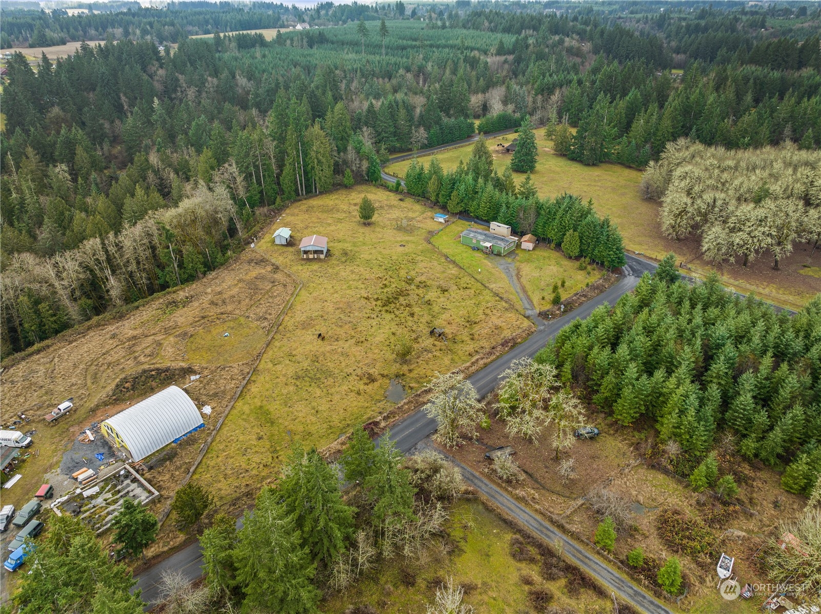 267 Limmer Road Winlock, WA 98596 - Photo 2 of 25 a view of a water pond with green field