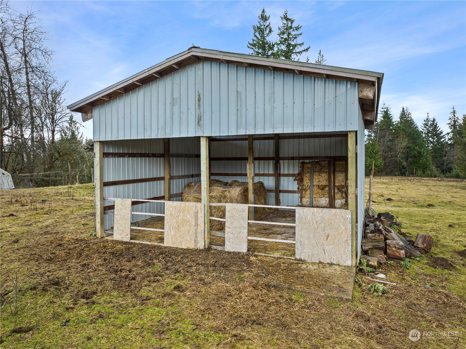 267 Limmer Road Winlock, WA 98596 - Photo 23 of 25 a house with trees in the background