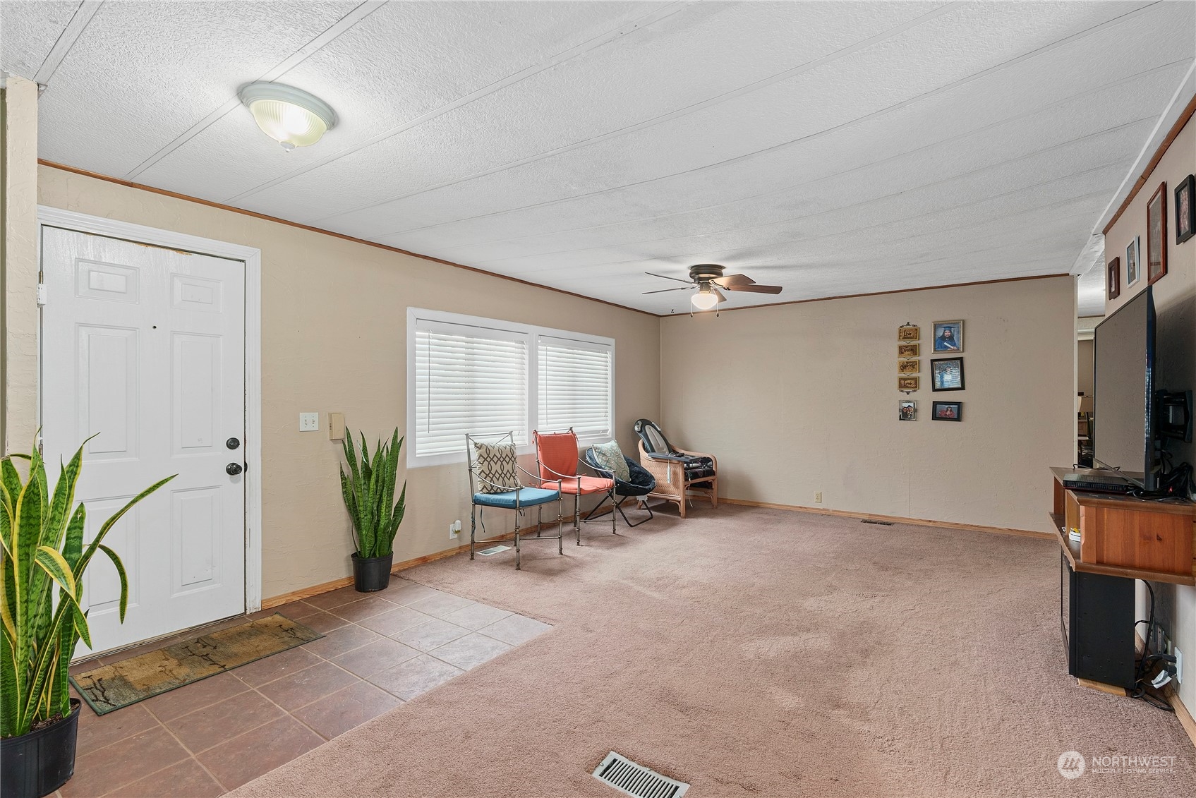 267 Limmer Road Winlock, WA 98596 - Photo 4 of 25 a view of a livingroom with furniture and a flat screen tv