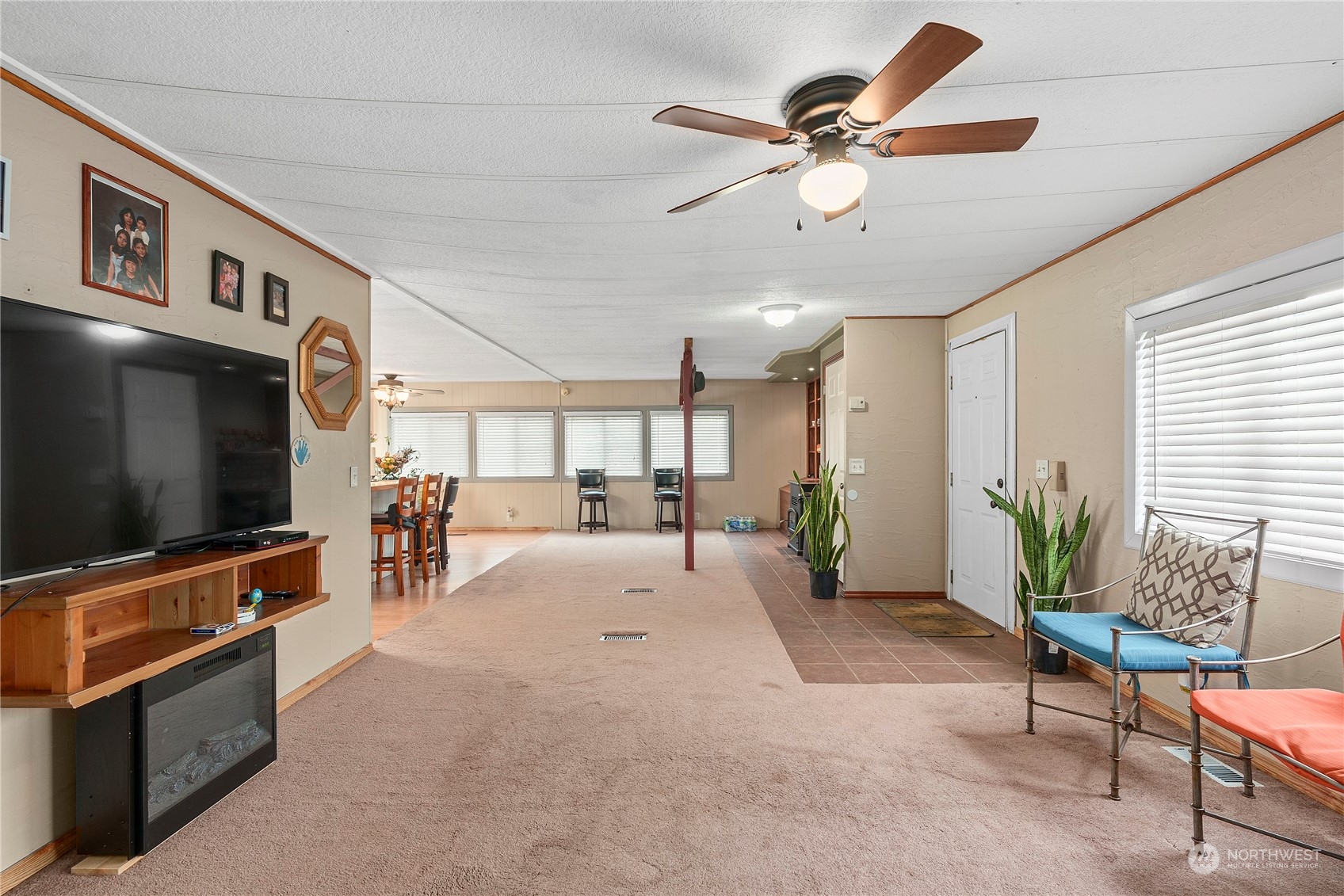 267 Limmer Road Winlock, WA 98596 - Photo 5 of 25 a living room with furniture and a flat screen tv