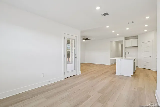 a view of kitchen with wooden floor