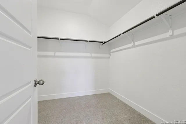 a view of backyard with green space