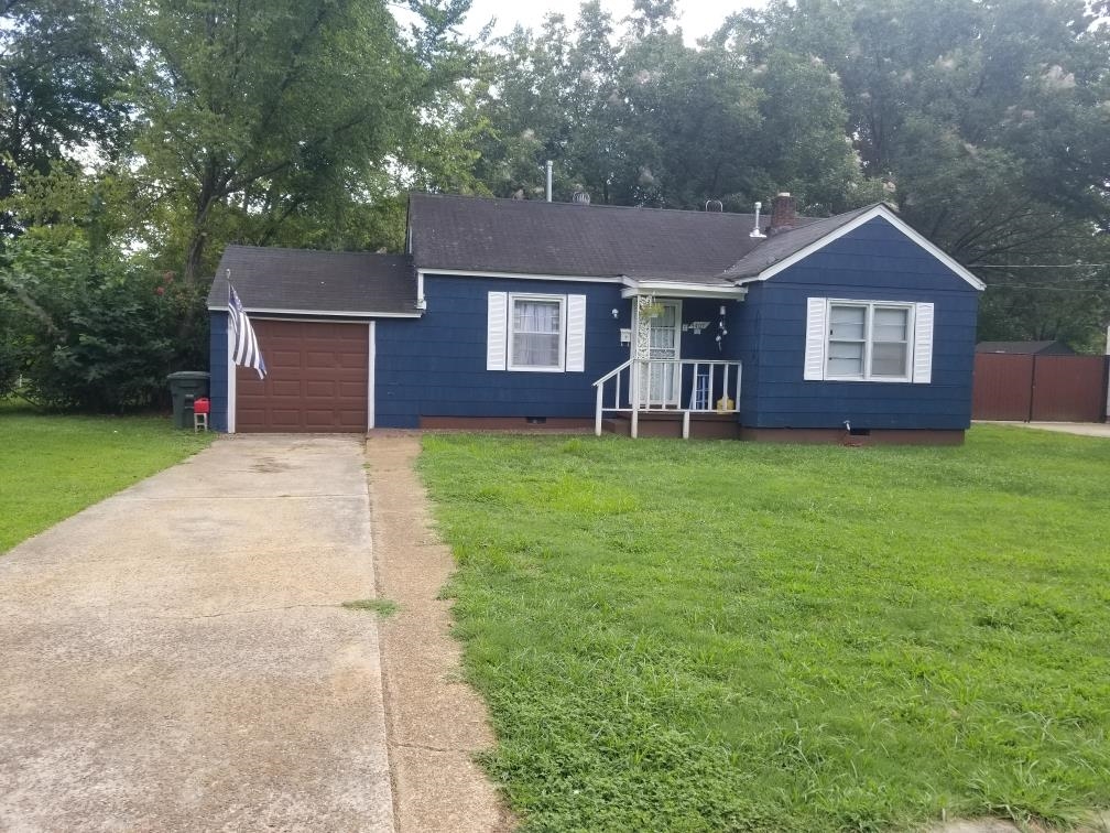 4407 Owen Road Memphis, TN 38122 - Photo 1 of 14 front view of a house with a yard
