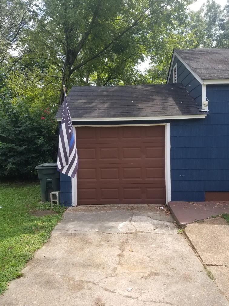4407 Owen Road Memphis, TN 38122 - Photo 2 of 14 front view of a house with a yard