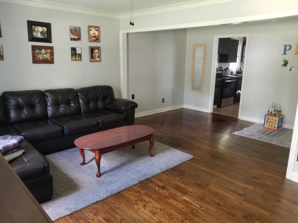 4407 Owen Road Memphis, TN 38122 - Photo 6 of 14 a living room with furniture and wooden floor