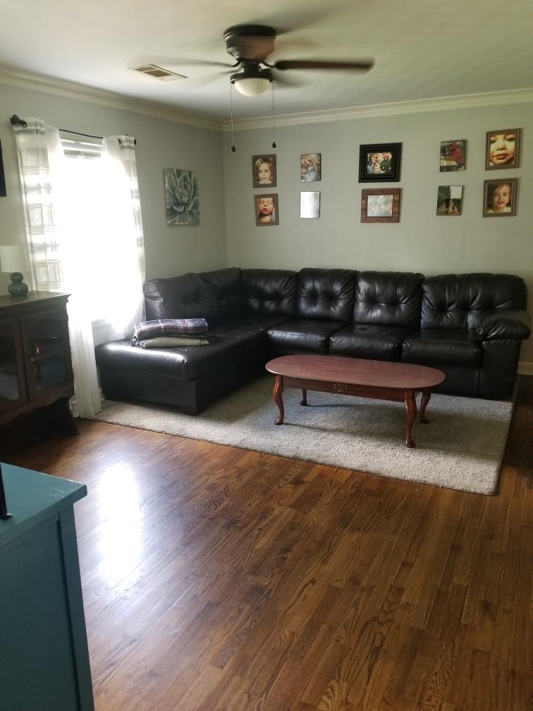 4407 Owen Road Memphis, TN 38122 - Photo 7 of 14 a living room with furniture and wooden floor