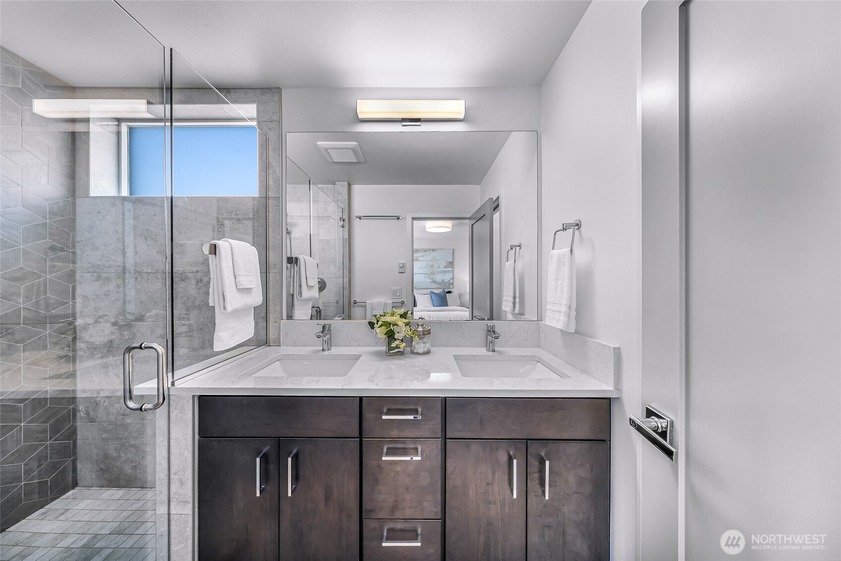 4218 Linden Avenue North Seattle, WA 98103 - Photo 21 of 38 a bathroom with a sink and a mirror