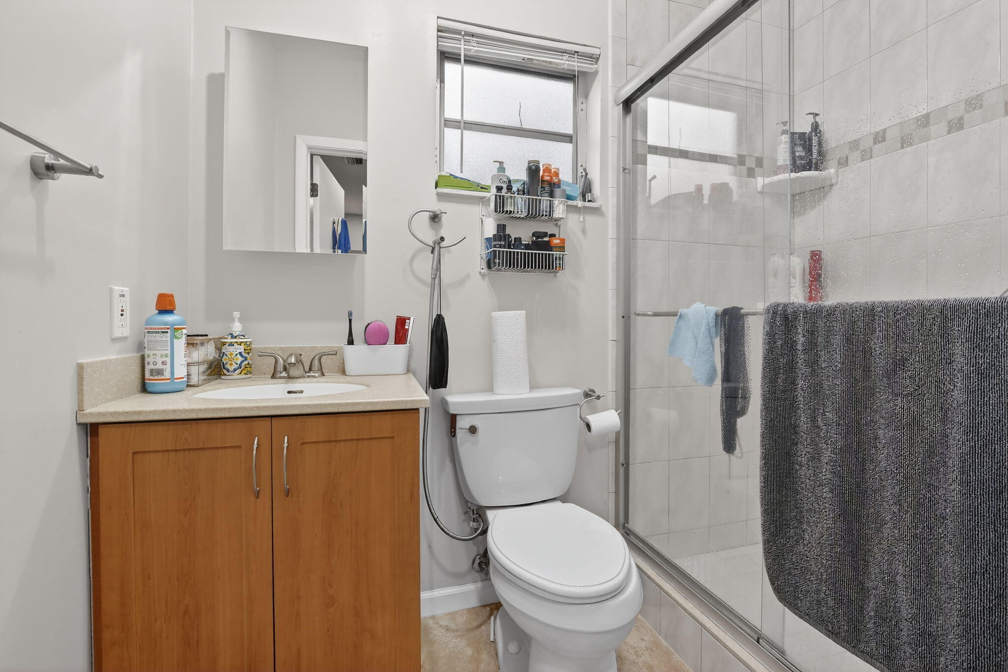 5507 McKinley Street Hollywood, FL 33021 - Photo 29 of 60 a bathroom with a sink toilet and shower