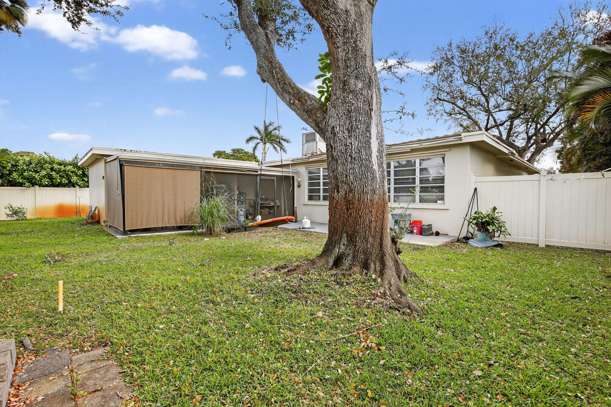 5507 McKinley Street Hollywood, FL 33021 - Photo 46 of 60 a house view with a garden space