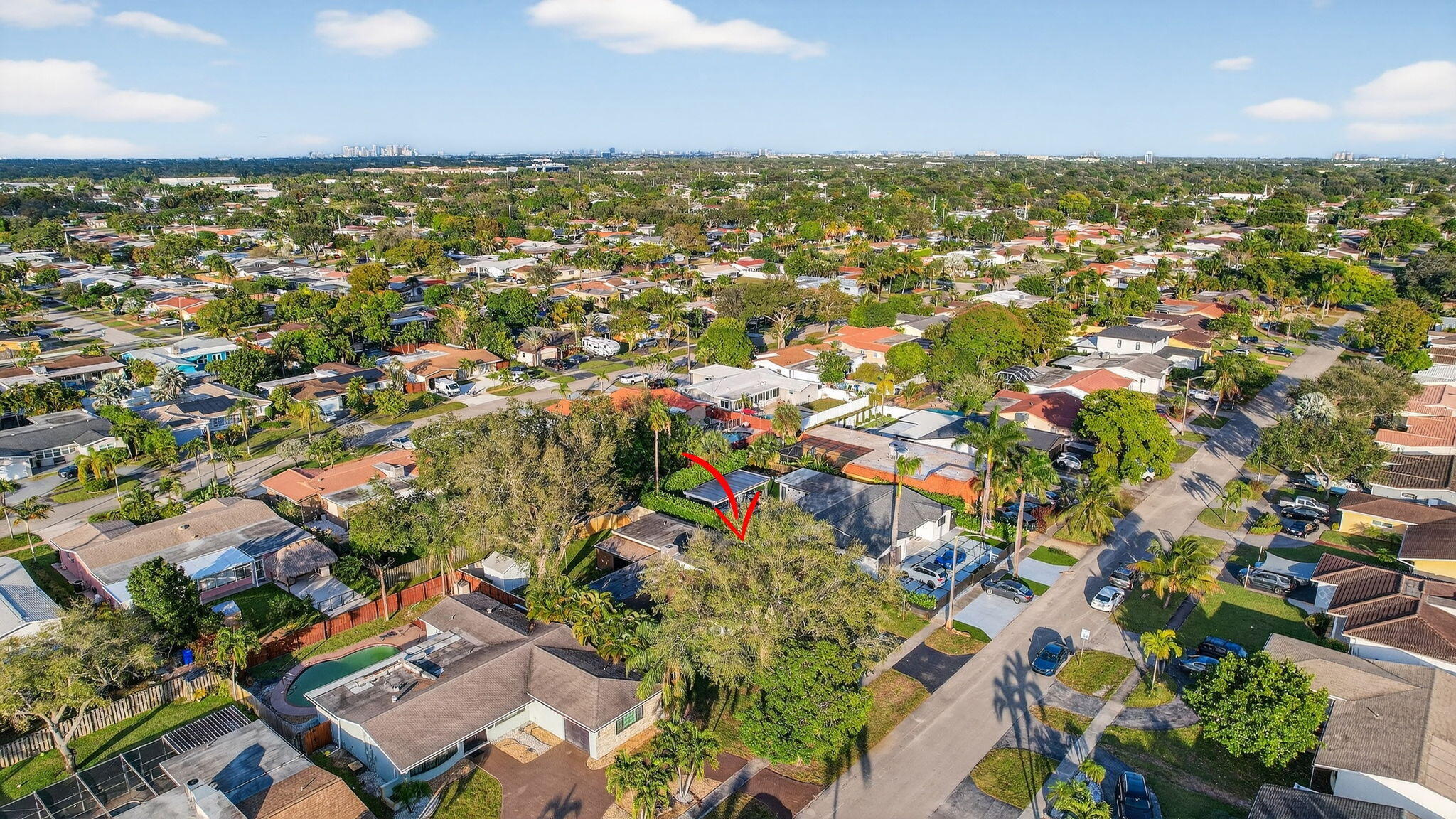5507 McKinley Street Hollywood, FL 33021 - Photo 54 of 60 an aerial view of residential houses with outdoor space and trees
