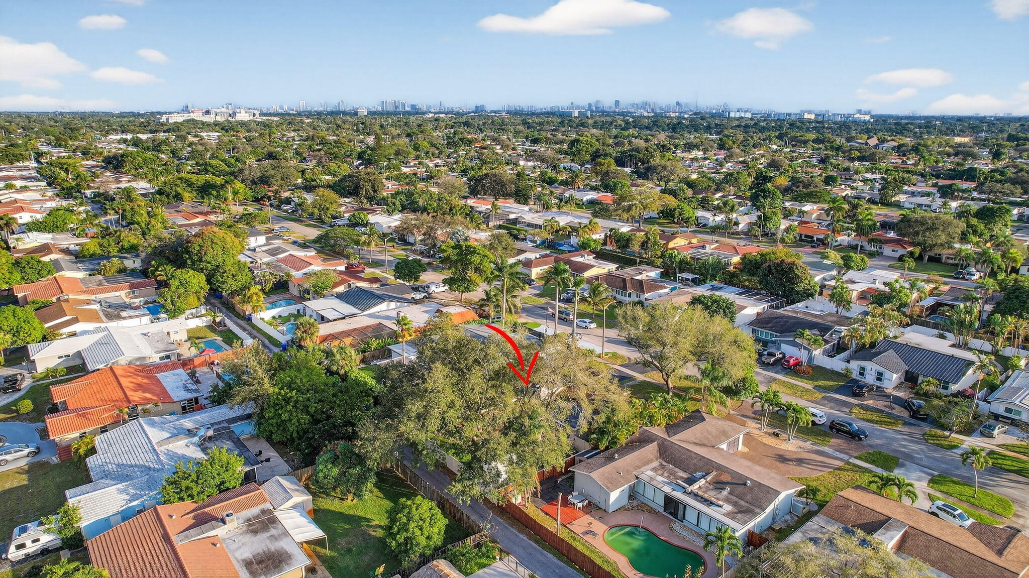 5507 McKinley Street Hollywood, FL 33021 - Photo 56 of 60 an aerial view of a city with lots of residential buildings