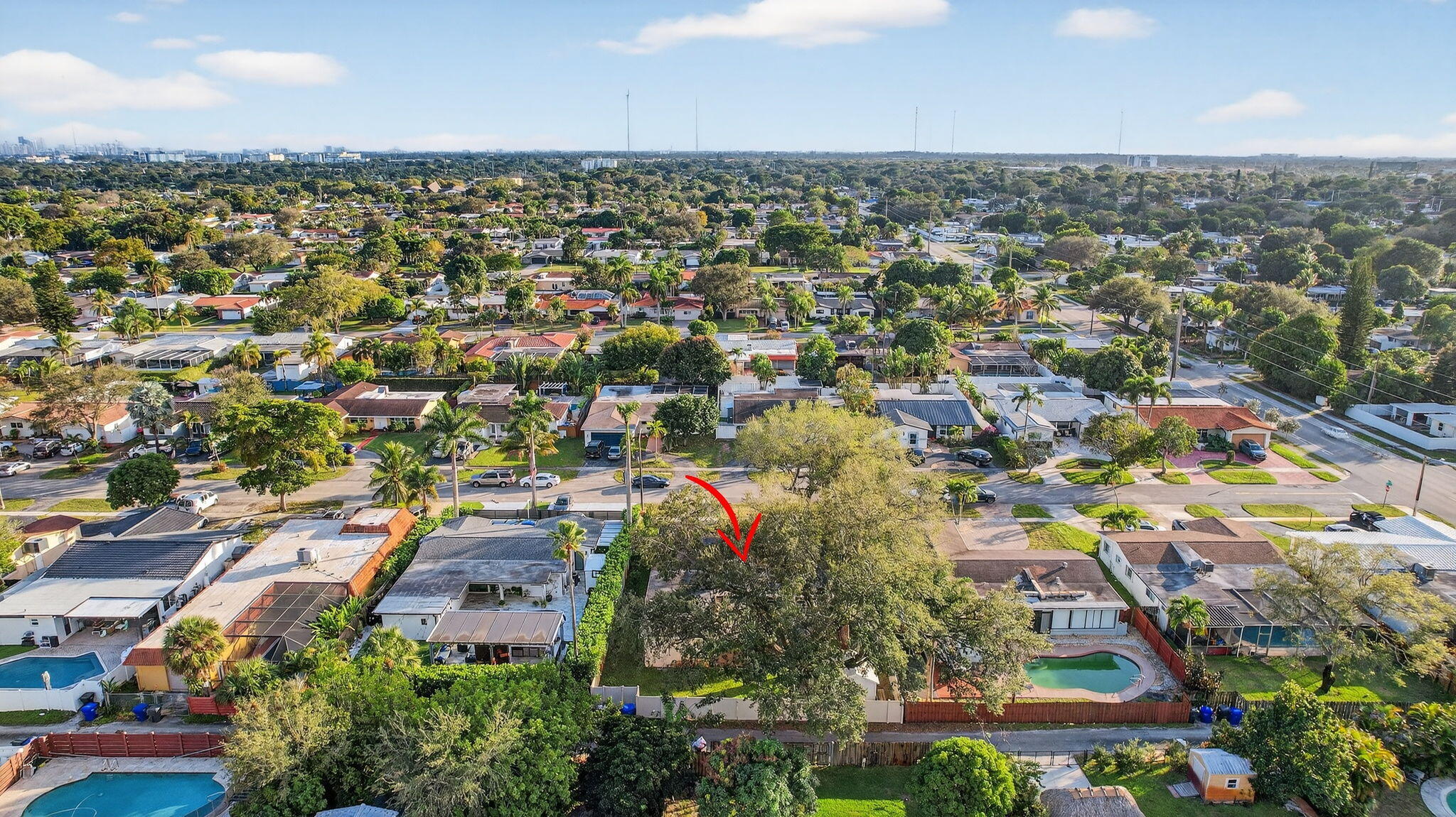 5507 McKinley Street Hollywood, FL 33021 - Photo 57 of 60 an aerial view of residential building with green space