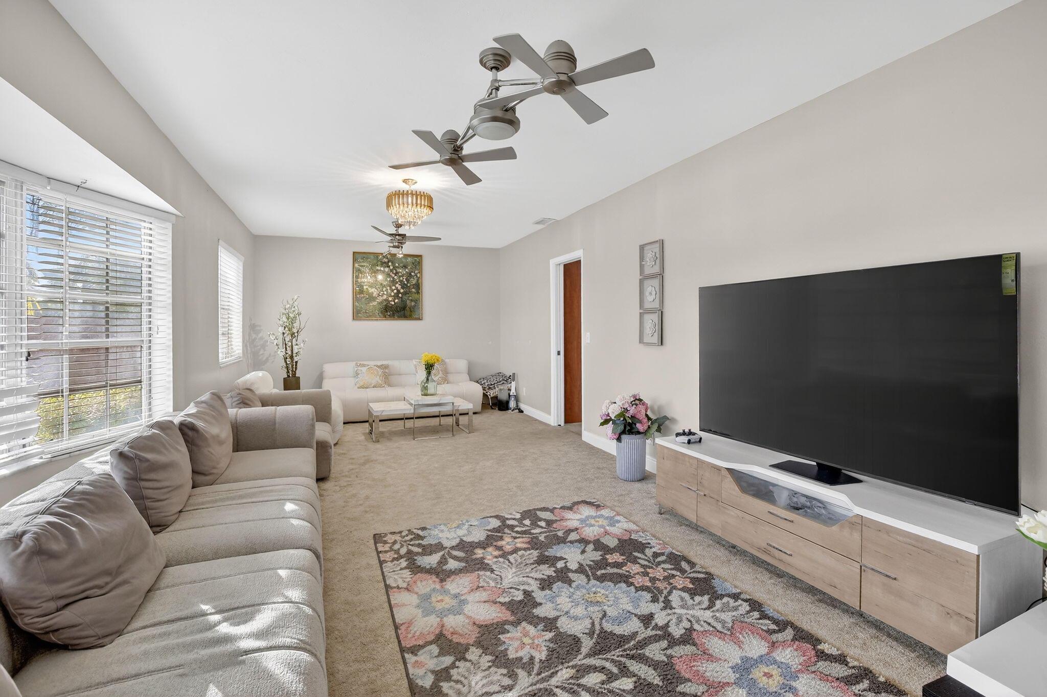 5507 McKinley Street Hollywood, FL 33021 - Photo 6 of 60 a living room with furniture and a flat screen tv