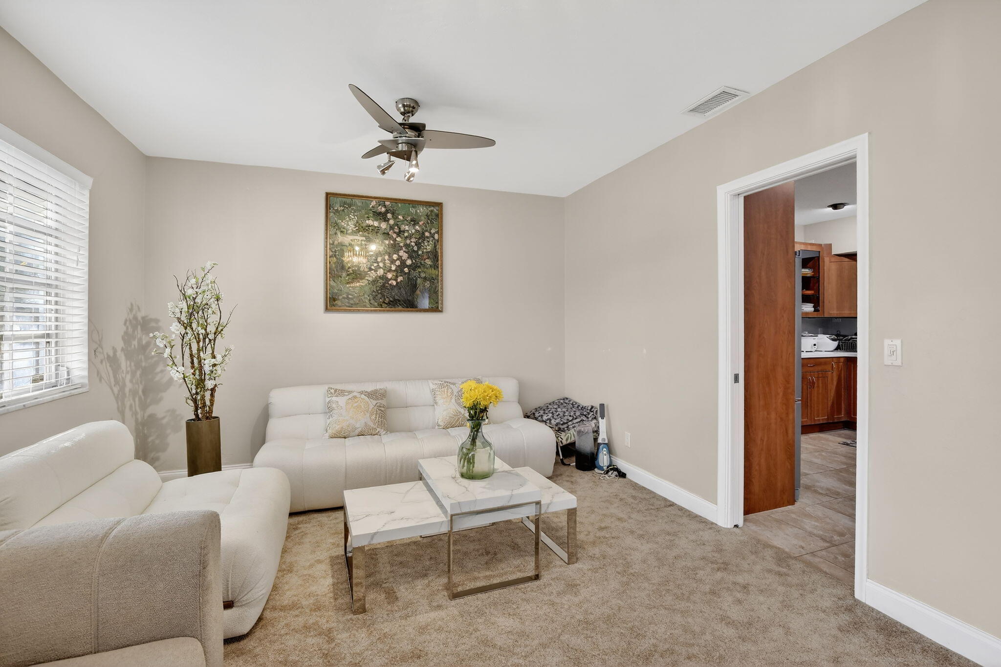 5507 McKinley Street Hollywood, FL 33021 - Photo 9 of 60 a living room with furniture and a window