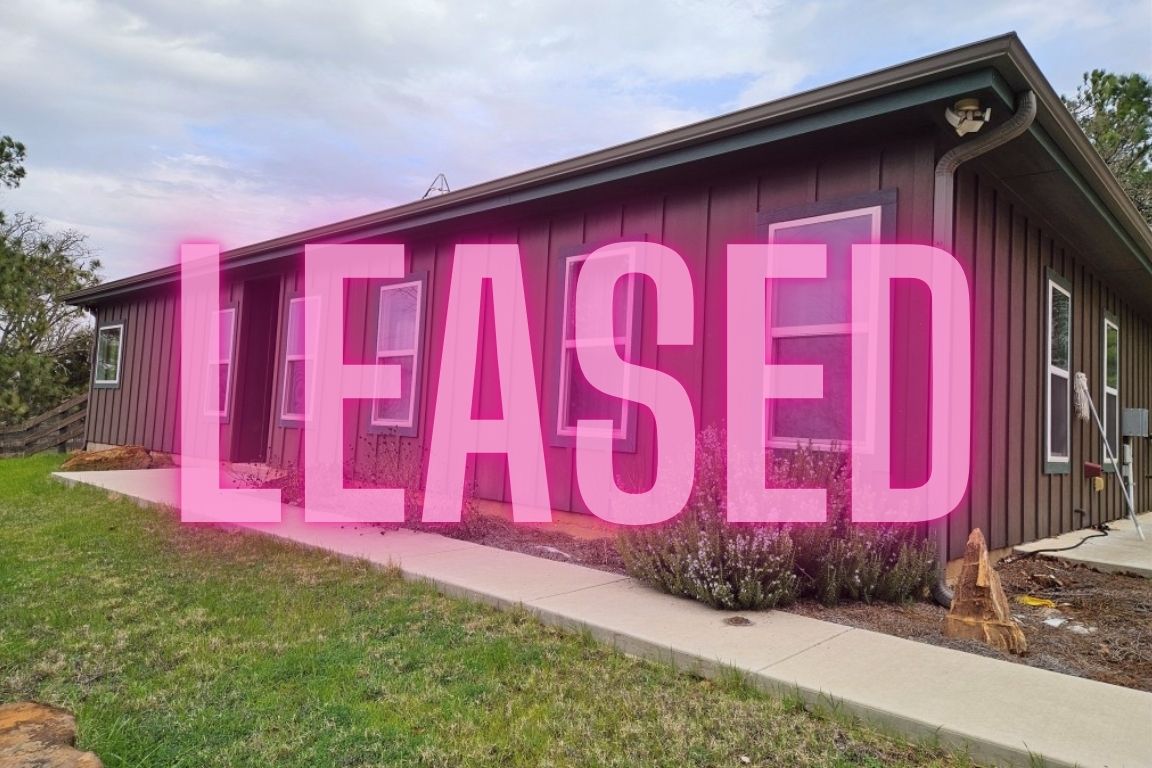 a front of door with yard