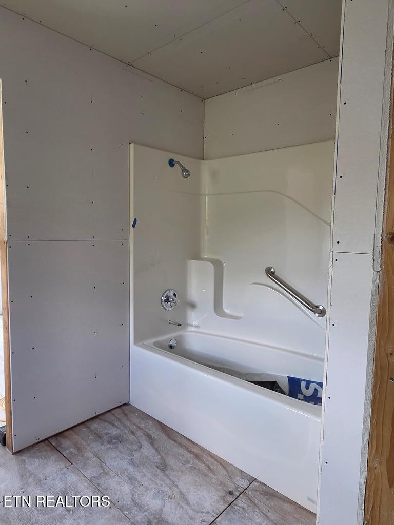1518 Cummingsville And Sparkman Road Doyle, TN 38559 - Photo 56 of 58 a bathroom with a sink and a bathtub