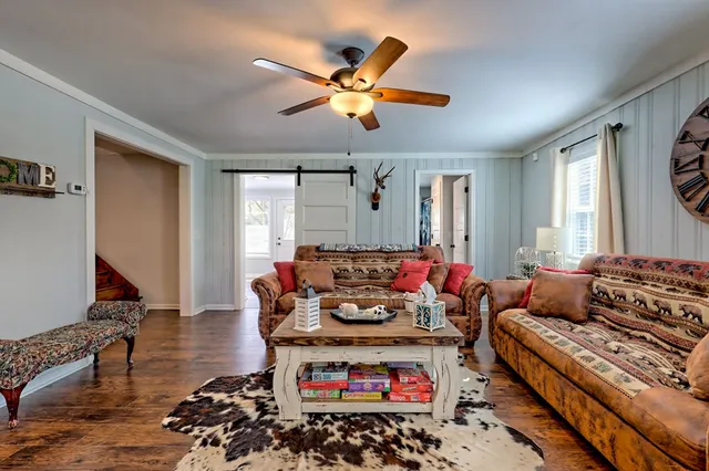 wooden floor in an empty room and a window