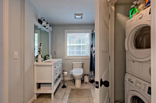a view of a hallway with washer and dryer