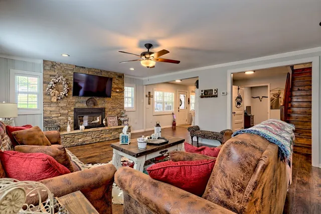 a view of entryway with stairs and wooden floor