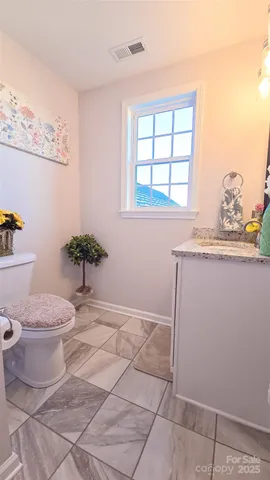 a room with cabinets and window