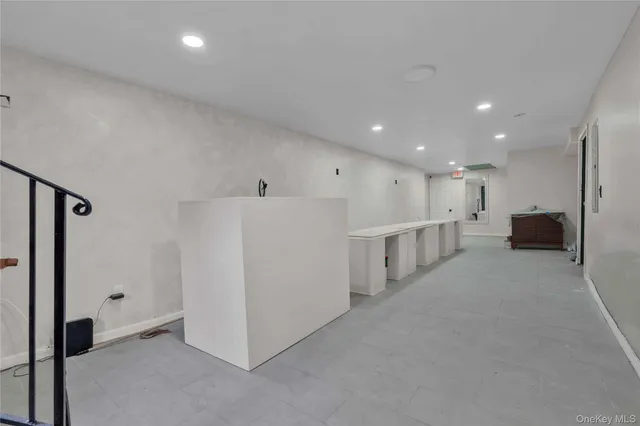 a view of kitchen with stainless steel appliances refrigerator oven