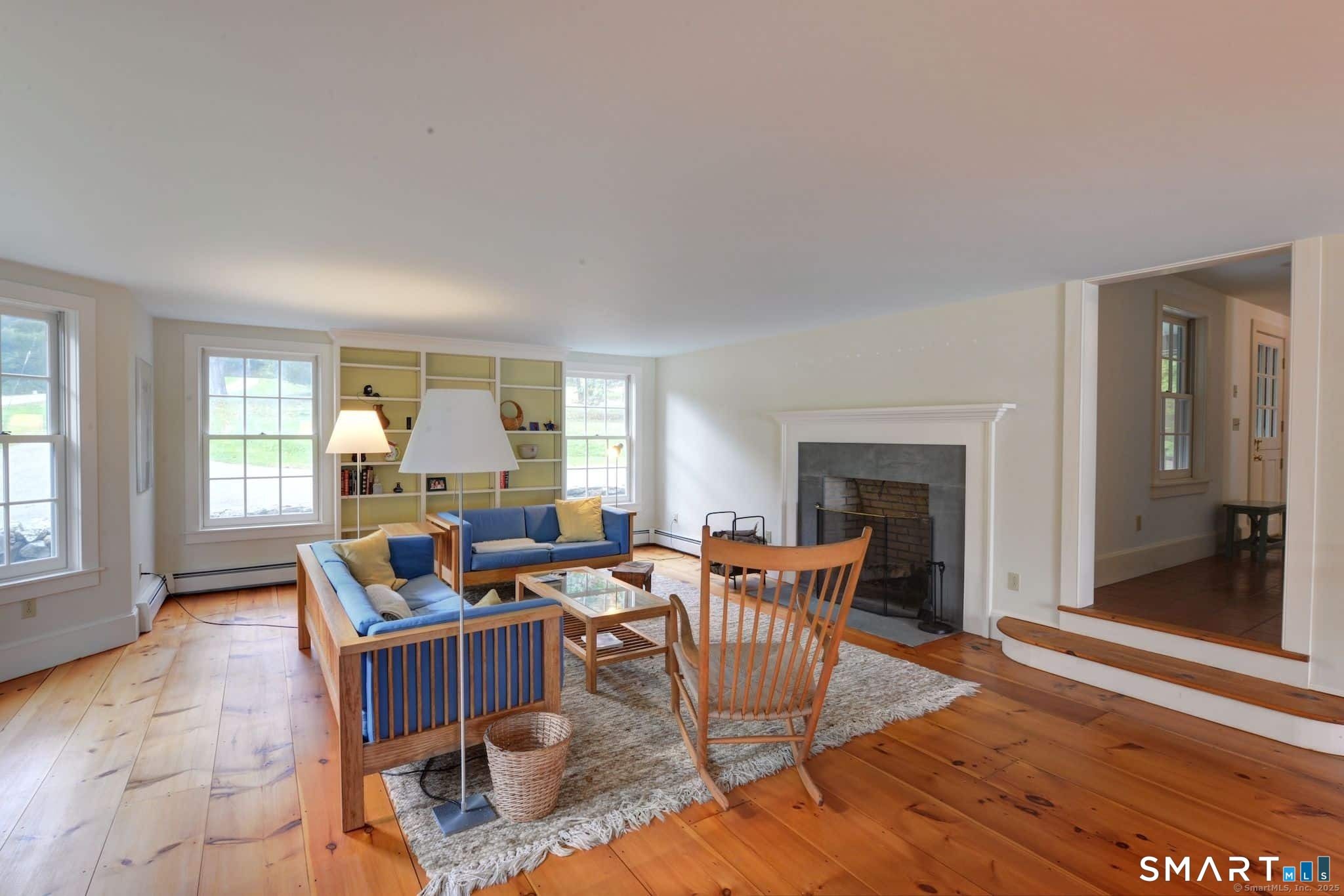 63 Old Cne Road Salisbury, CT 06039 - Photo 13 of 39 a living room with fireplace furniture and a wooden floor