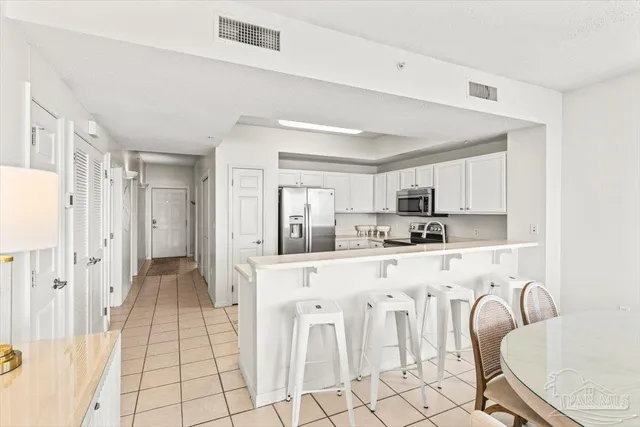 a front view of a house with lots of furniture