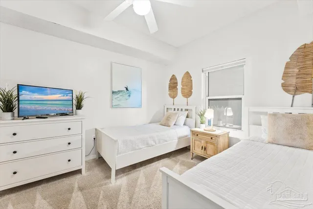 a living room with furniture and a large mirror